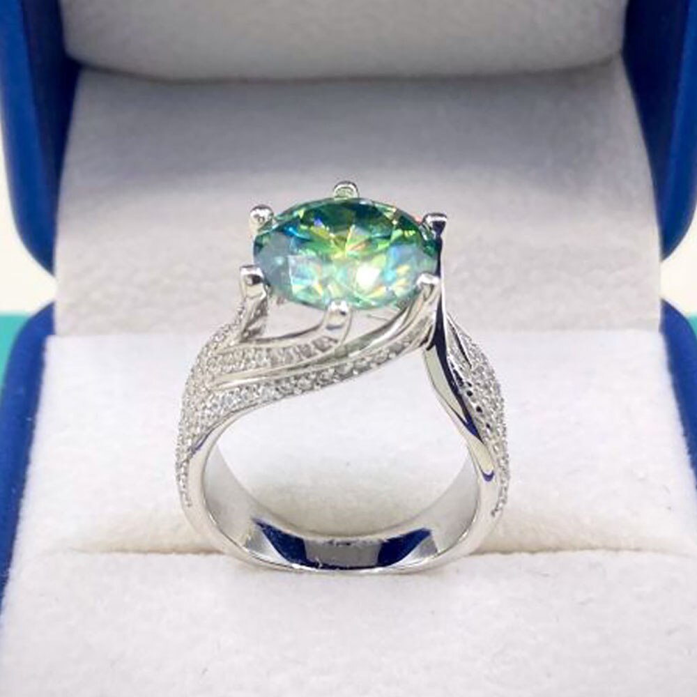 3 Carat to 5 Carat D Color VVS1 Green Moissanite and Zircon Accent Platinum Plated 925 Sterling Silver Ring
