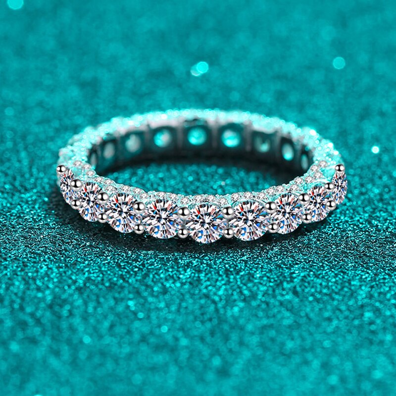2.1 Carat Total Moissanite and Zircon Accent 18K White Gold Plated 925 Sterling Silver Eternity Band