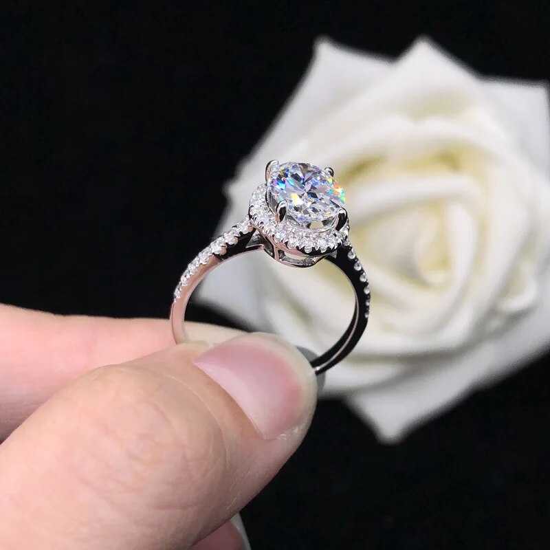 1 Carat or 2 Carat Oval Moissanite and Zircon Accent Platinum Plated 925 Sterling Ring