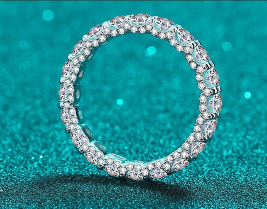 2.1 Carat Total Moissanite and Zircon Accent 18K White Gold Plated 925 Sterling Silver Eternity Band